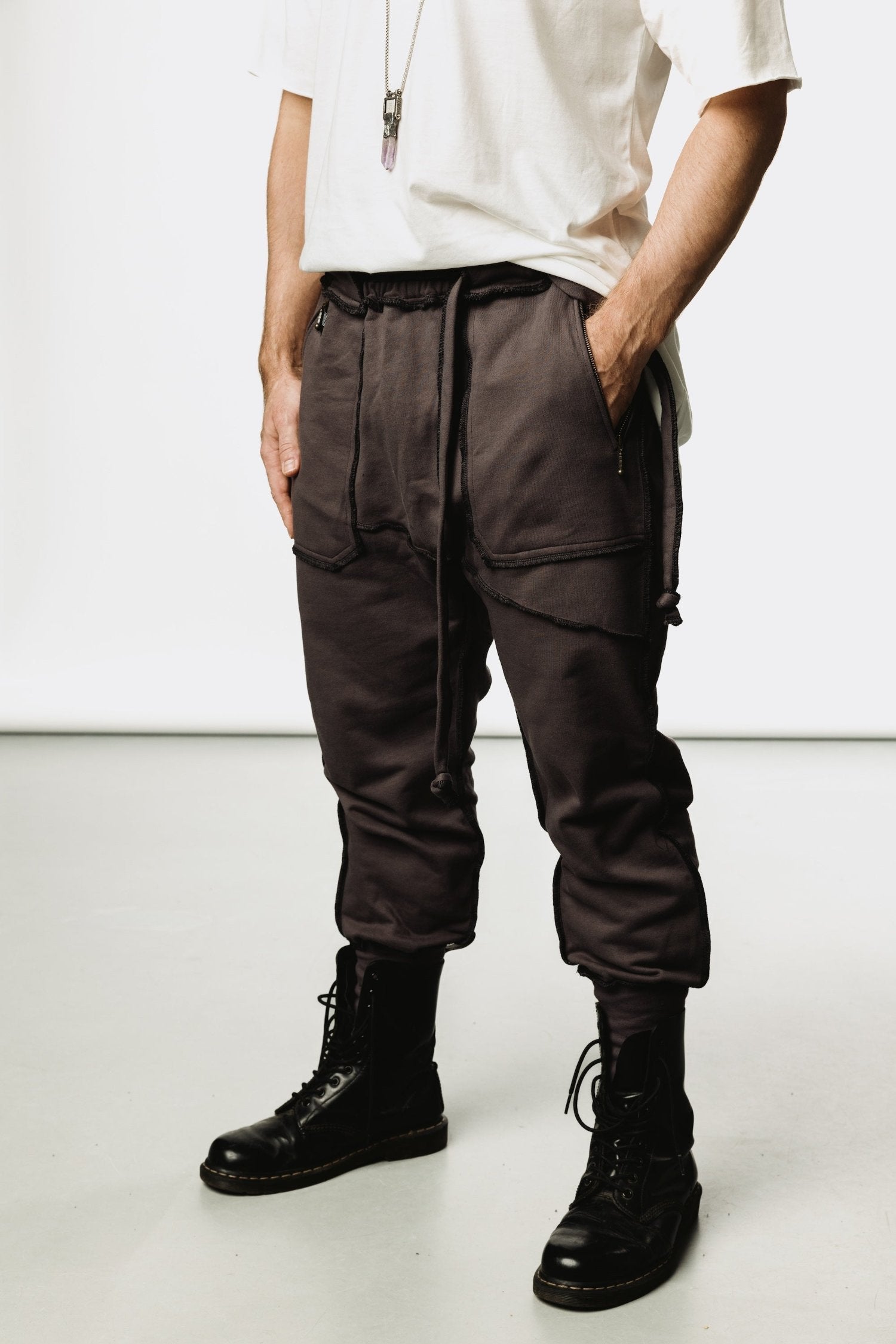 VALO Design Pants NORTHENER - These jogger style cotton pants are made from high quality and durable 100% Cotton French Terry fabric. Two zipper pockets on the sides, unique overlock stitching details.