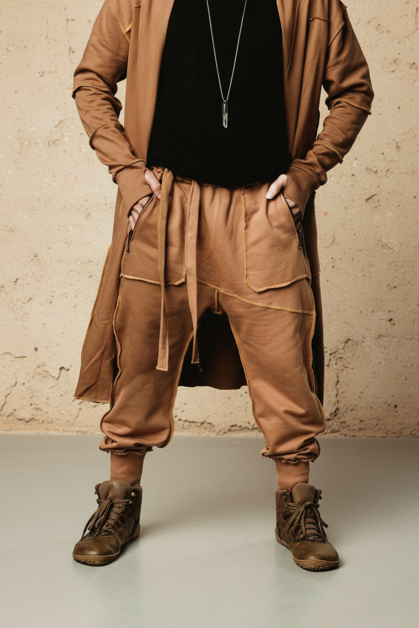 VALO Design Pants NORTHENER - These jogger style cotton pants are made from high quality and durable 100% Cotton French Terry fabric. Two zipper pockets on the sides, unique overlock stitching details.