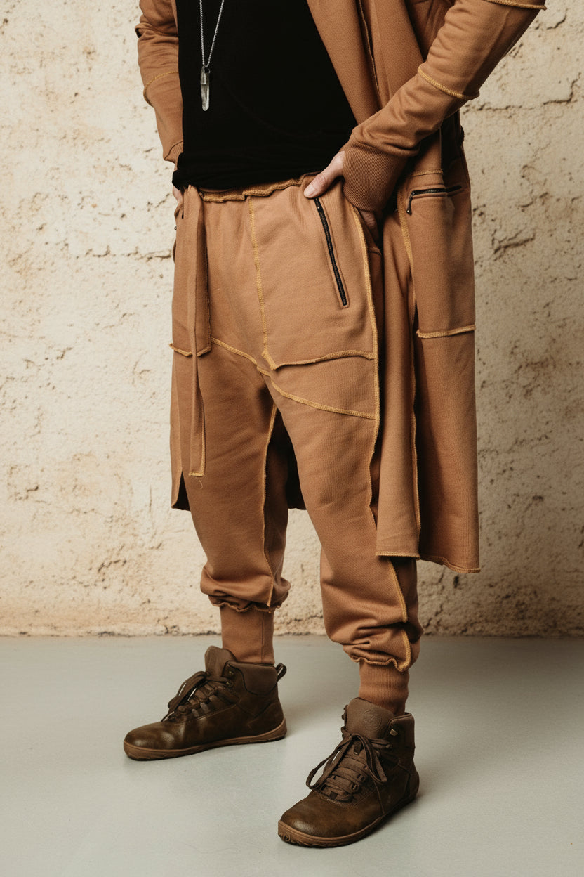 VALO Design Pants NORTHENER - These jogger style cotton pants are made from high quality and durable 100% Cotton French Terry fabric. Two zipper pockets on the sides, unique overlock stitching details.