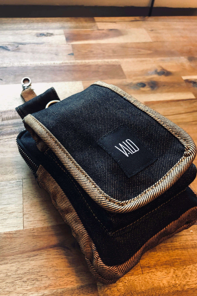 VALO Design Bag TASKU - A functional belt bag made from recycled orange / black denim
